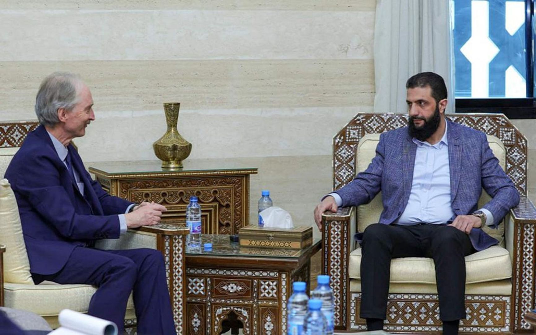 After assuming power, al-Sharaa replaced his military attire with civilian clothing