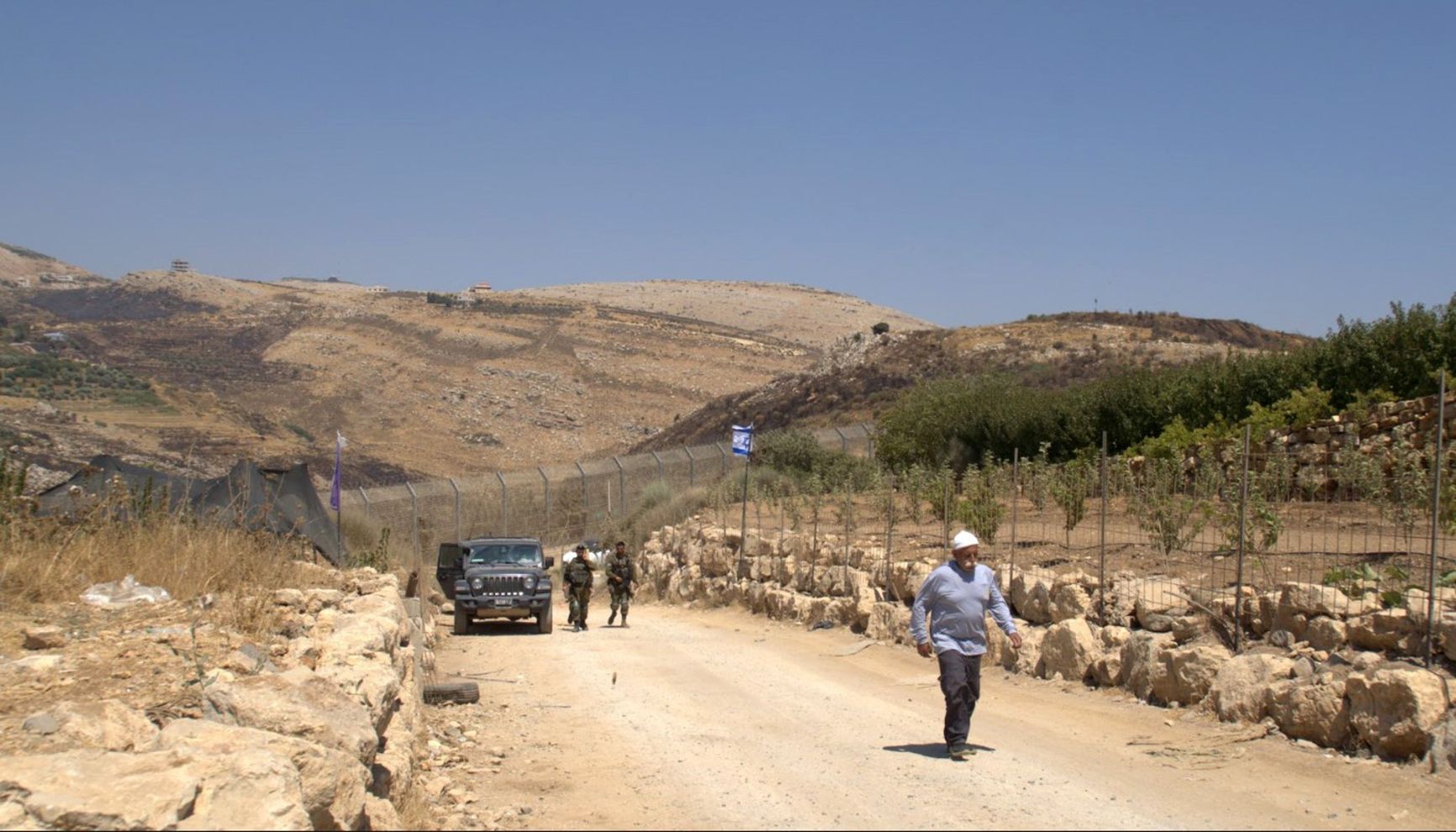 A resident of Majdal Shams at the Syrian border, where his brother lives just beyond the barbed-wire fence. He tried to pass food to him through the soldiers.